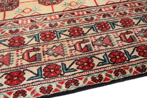 Backside of handmade 1990s Baloch rug showing knot structure and weave density