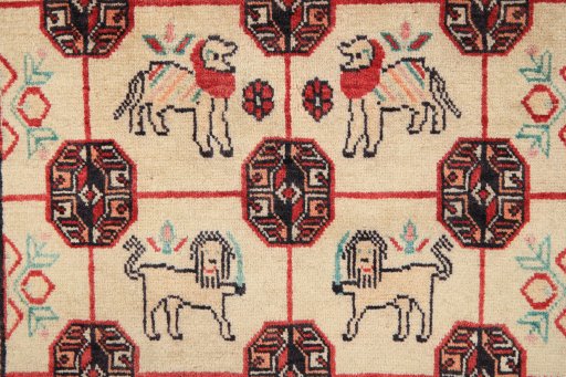 Full view of 1990s Baloch rug from Iran / Persia, 195 × 108 cm in Cream tones