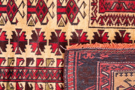 Close-up detail of 1970s Baloch rug from Iran / Persia showing Wool weave