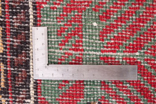 Close-up detail of 1970s Baloch rug from Iran / Persia showing Wool weave