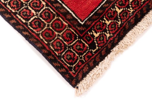 Central medallion detail of 1970s Baloch rug from Iran / Persia