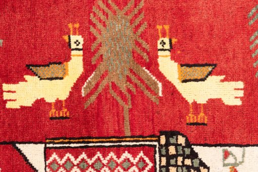 Corner detail of 1970s Baloch rug showing border pattern and Wool pile