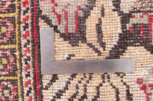 Corner detail of 1998s Baloch rug showing border pattern and Wool pile
