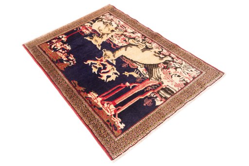 Corner detail of 1998s Baloch rug showing border pattern and Wool pile