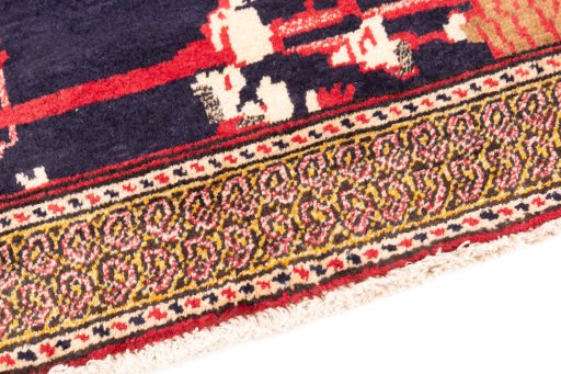 Backside of handmade 1998s Baloch rug showing knot structure and weave density