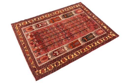 Corner detail of 1987s Baloch rug showing border pattern and Wool pile