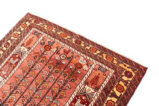Surface texture of 1987s Baloch rug with natural Wool and intricate pattern