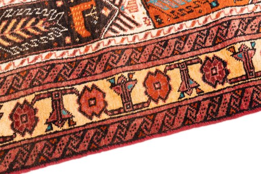 Backside of handmade 1987s Baloch rug showing knot structure and weave density