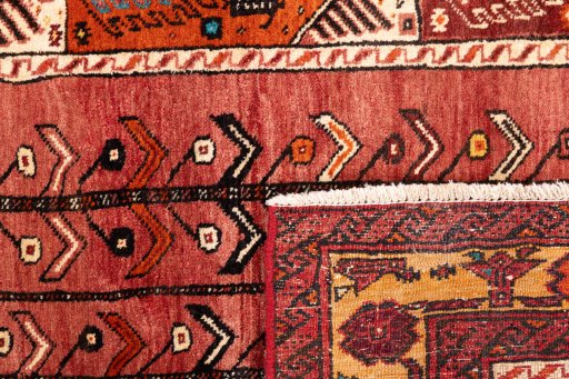 Close-up detail of 1987s Baloch rug from Iran / Persia showing Wool weave