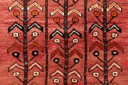 Full view of 1987s Baloch rug from Iran / Persia, 150 × 106 cm in Terracotta tones