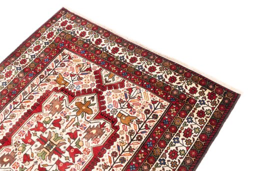 Surface texture of 1998s Baloch rug with natural Wool and intricate pattern