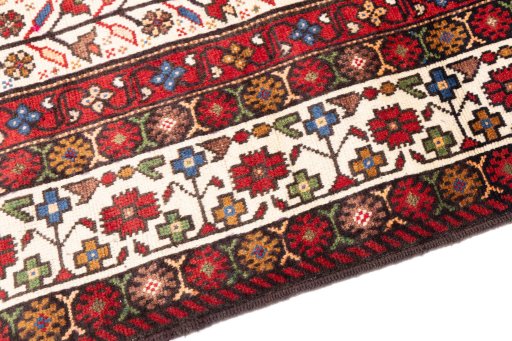 Backside of handmade 1998s Baloch rug showing knot structure and weave density