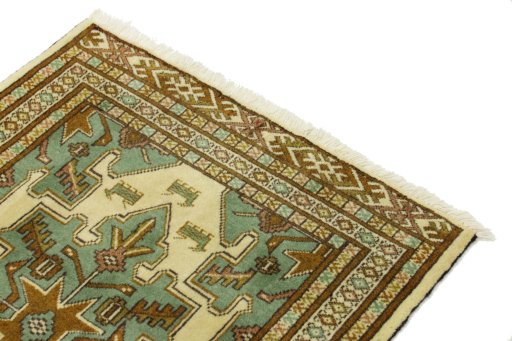 Surface texture of 2000s Baloch rug with natural Wool and intricate pattern