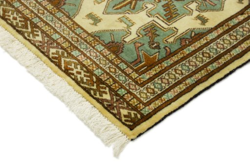 Backside of handmade 2000s Baloch rug showing knot structure and weave density