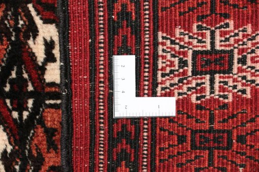 Close-up detail of New Baloch rug from Iran / Persia showing Wool weave