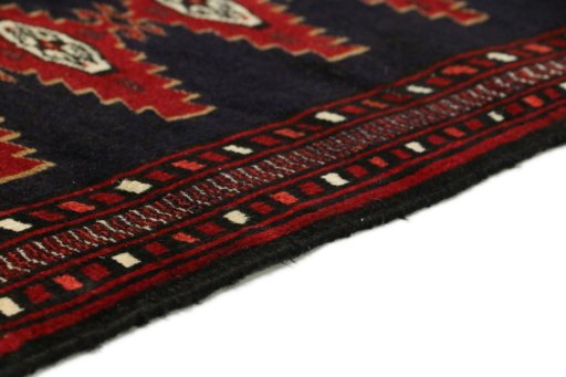 Central medallion detail of 1990s Baloch rug from Iran / Persia