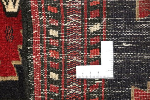 Close-up detail of 1990s Baloch rug from Iran / Persia showing Wool weave