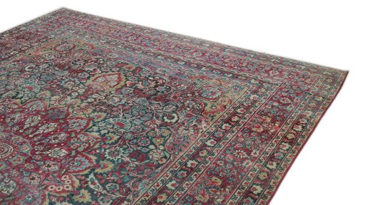 Surface texture of 1920s Dorokhsh rug with natural Wool and intricate pattern
