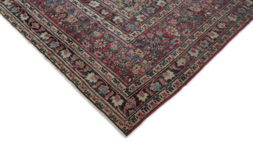 Backside of handmade 1920s Dorokhsh rug showing knot structure and weave density