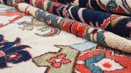 Close-up detail of 1990s Gharajeh rug from Iran / Persia showing Wool weave