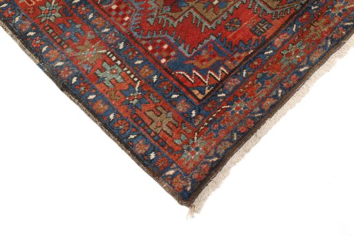 Backside of handmade 1920s Gharajeh rug showing knot structure and weave density