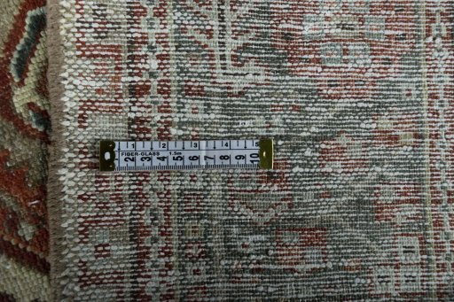Corner detail of 1930s Gharajeh rug showing border pattern and Wool pile