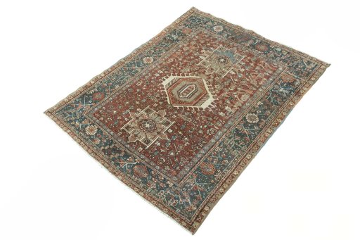 Corner detail of 1930s Gharajeh rug showing border pattern and Wool pile