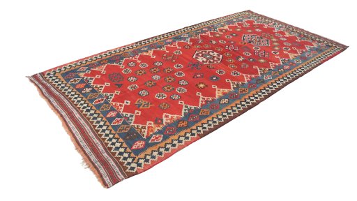 Corner detail of 1940s Ghashghai rug showing border pattern and Wool pile