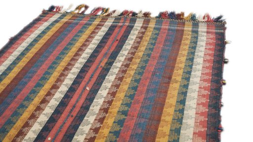 Surface texture of 1940s Ghashghai rug with natural Wool and intricate pattern