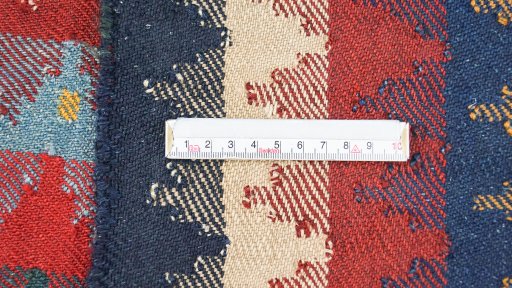 Close-up detail of 1920s Ghashghai rug from Iran / Persia showing Wool weave