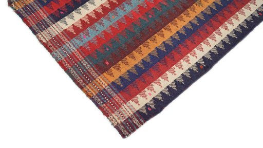 Backside of handmade 1920s Ghashghai rug showing knot structure and weave density