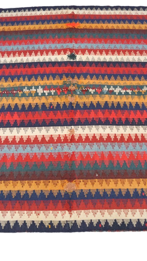 Close-up detail of 1920s Ghashghai rug from Iran / Persia showing Wool weave