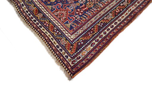 Backside of handmade 1940s Ghashghai rug showing knot structure and weave density