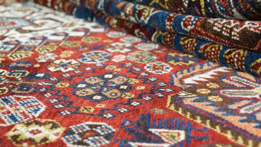 Close-up detail of 1940s Ghashghai rug from Iran / Persia showing Wool weave