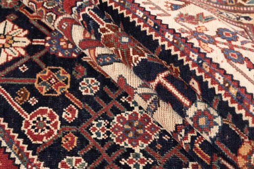 Corner detail of 1900s Ghashghai rug showing border pattern and Wool pile
