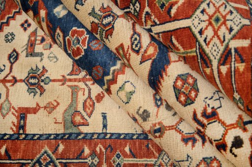Corner detail of 2000s Ghashghai rug showing border pattern and Wool pile