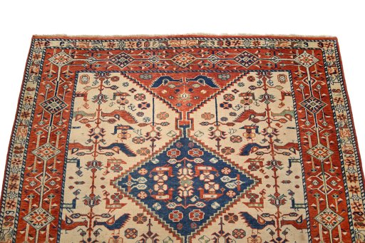 Surface texture of 2000s Ghashghai rug with natural Wool and intricate pattern