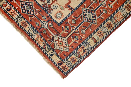 Backside of handmade 2000s Ghashghai rug showing knot structure and weave density