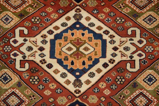 Central medallion detail of New Ghashghai rug from Iran / Persia