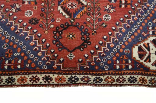 Close-up detail of 2000s Ghashghai rug from Iran / Persia showing Wool weave