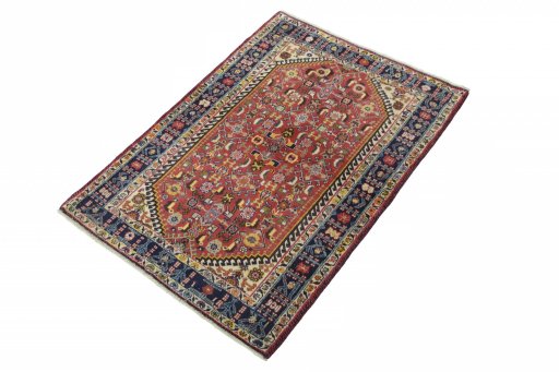 Corner detail of 2000s Ghashghai rug showing border pattern and Wool pile