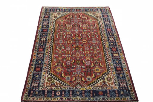 Surface texture of 2000s Ghashghai rug with natural Wool and intricate pattern