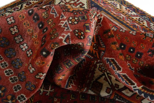 Close-up detail of 2000s Ghashghai rug from Iran / Persia showing Wool weave