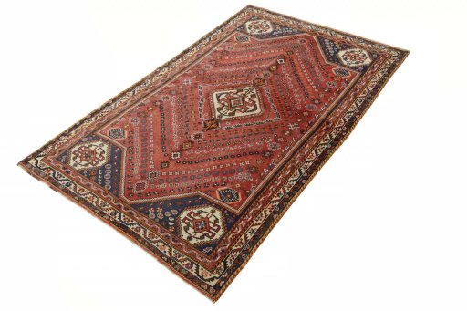 Corner detail of 2000s Ghashghai rug showing border pattern and Wool pile