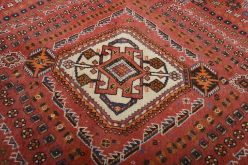 Central medallion detail of 2000s Ghashghai rug from Iran / Persia