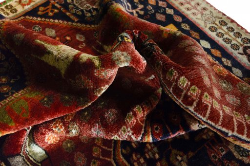 Close-up detail of 2000s Ghashghai rug from Iran / Persia showing Wool weave