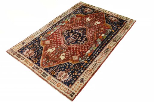 Corner detail of 2000s Ghashghai rug showing border pattern and Wool pile