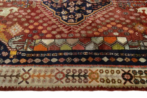 Full view of 2000s Ghashghai rug from Iran / Persia, 229 × 154 cm in Red tones