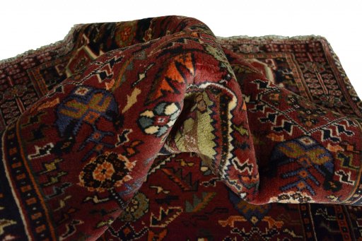 Close-up detail of 2000s Ghashghai rug from Iran / Persia showing Wool weave