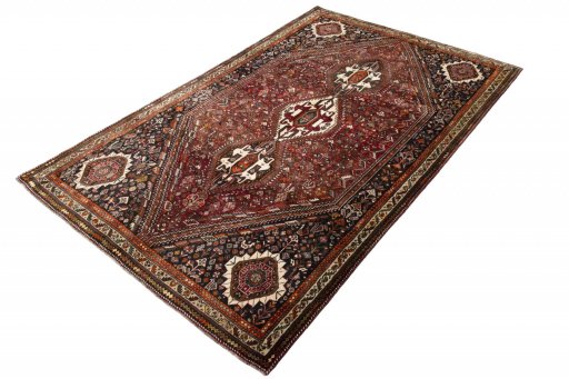 Corner detail of 2000s Ghashghai rug showing border pattern and Wool pile